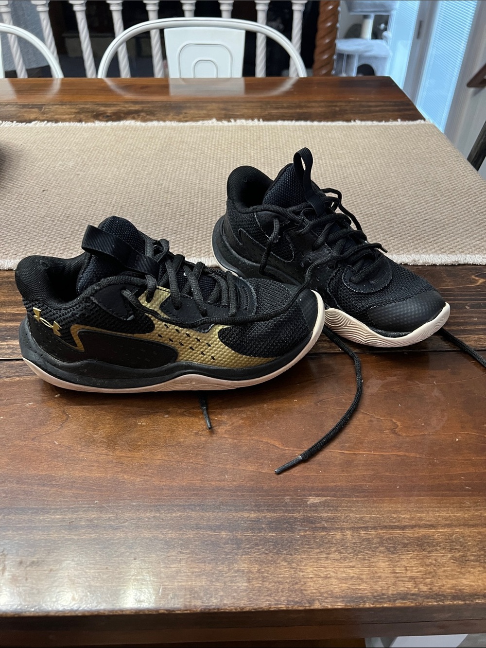 Under Armour Kids Black and Gold Athletic Sneakers